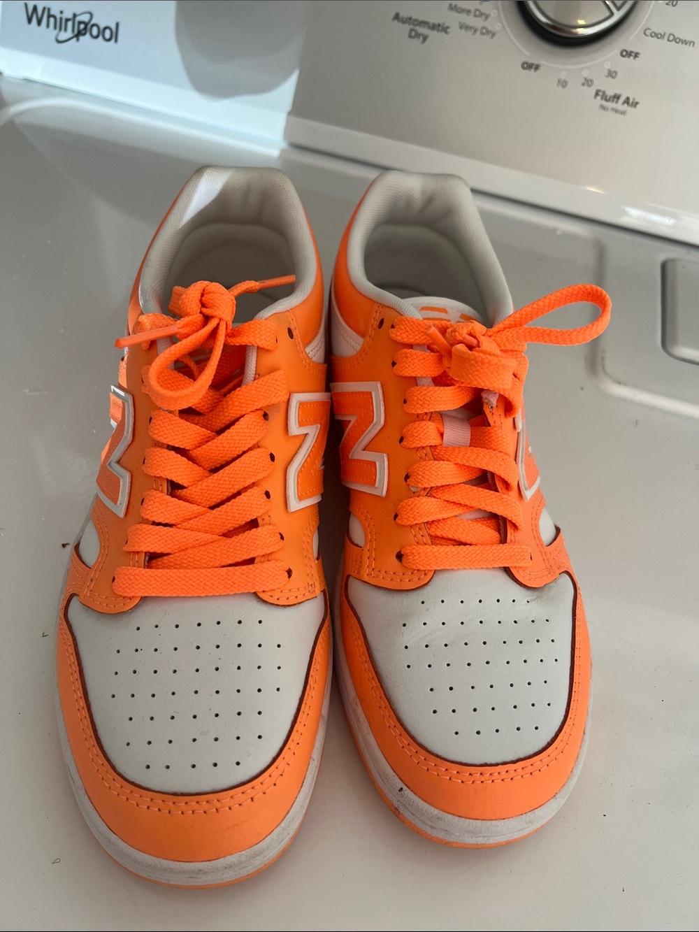 Nike Orange and White Low-Top Sneakers with 'N' Accent